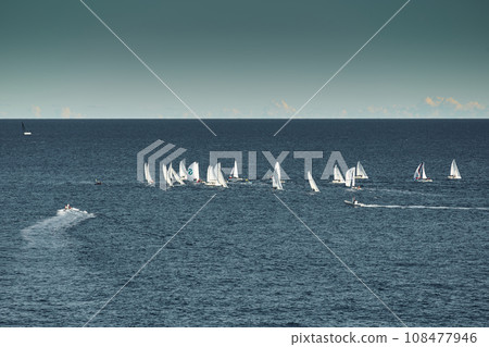 A lot of sail boats and yachts in the sea went on a sailing trip near port Hercules in Monaco, Monte Carlo, sail regatta, race 108477946