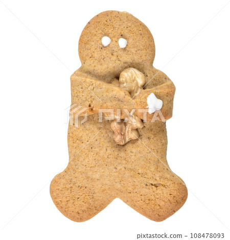 Gingerbread man cookie embrancing walnut 108478093