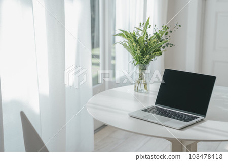 table with laptop table with laptop 108478418