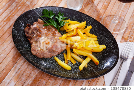 Fried pork with potatoes 108478880