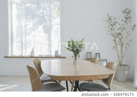 Dining table with a vase Dining table with a vase 108479173