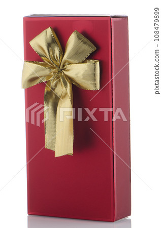 Red box with gold bow 108479899