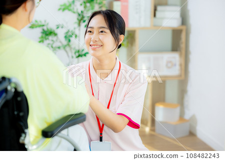 young woman, caregiver, wheelchair 108482243