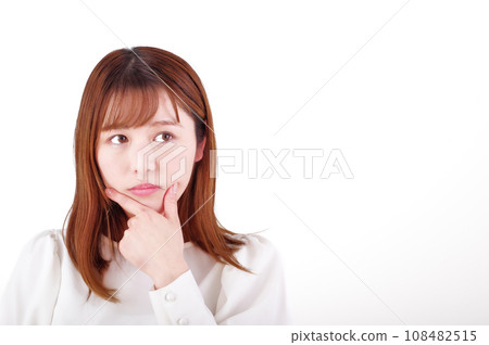 A young woman thinking (white background) A young woman thinking (white background) 108482515