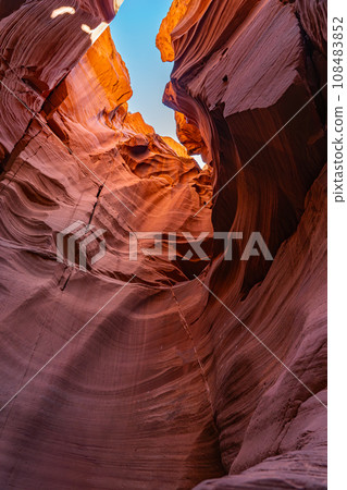 The blue sky seen from Canyon X in Antelope Canyon The blue sky seen from Canyon X in Antelope Canyon 108483852