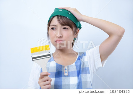 Image of a woman painting with DIY Negative 108484535
