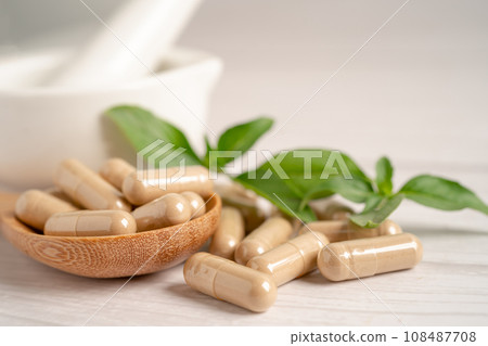 Alternative medicine herbal organic capsule with vitamin E omega 3 fish oil, mineral, drug with herbs leaf natural supplements for healthy good life. 108487708