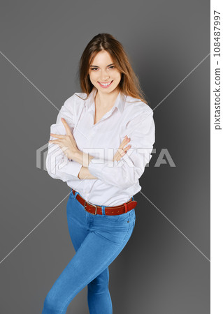 Overhead view of happy smiling woman with arms crossed on chest 108487997