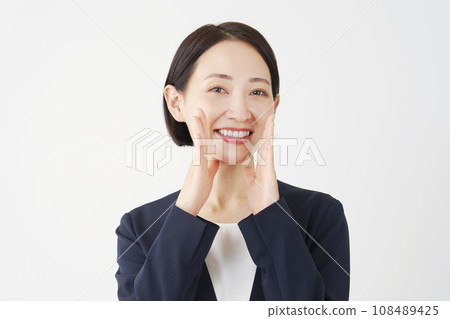 Middle-aged business woman talking, white background Middle-aged business woman talking, white background 108489425