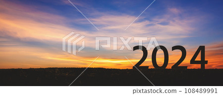 New year 2024 with sunset sky background New year 2024 with sunset sky background 108489991