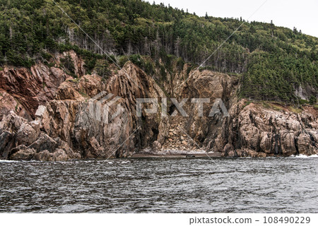 A panoramic view of the Cape Breton Island Coast line cliff scenic Cabot Trail route, Nova Scotia Hghlands Canada A panoramic view of the Cape Breton Island Coast line cliff scenic Cabot Trail route, Nova Scotia Hghlands Canada 108490229