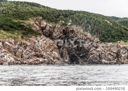 A panoramic view of the Cape Breton Island Coast line cliff scenic Cabot Trail route, Nova Scotia Hghlands Canada A panoramic view of the Cape Breton Island Coast line cliff scenic Cabot Trail route, Nova Scotia Hghlands Canada 108490238