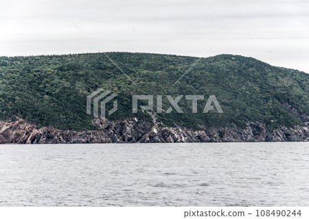 A panoramic view of the Cape Breton Island Coast line cliff scenic Cabot Trail route, Nova Scotia Hghlands Canada A panoramic view of the Cape Breton Island Coast line cliff scenic Cabot Trail route, Nova Scotia Hghlands Canada 108490244