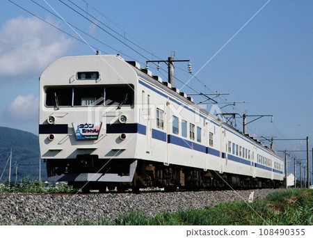 715 series train running near Hizen Kashima Station on the Nagasaki Main Line 108490355