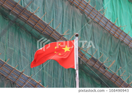 chinese flag with the construction site background 108490943