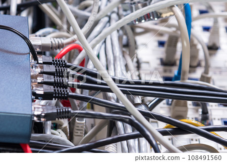 Detail of server room with patch cables 108491560
