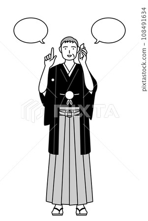 A senior man in a crested hakama pointing while talking on the phone, at a New Year's shrine visit or a wedding. A senior man in a crested hakama pointing while talking on the phone, at a New Year's shrine visit or a wedding. 108491634