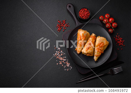 Delicious cabbage rolls with meat, rice, salt, spices and herbs Delicious cabbage rolls with meat, rice, salt, spices and herbs 108491972