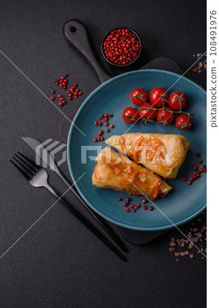 Delicious cabbage rolls with meat, rice, salt, spices and herbs 108491976