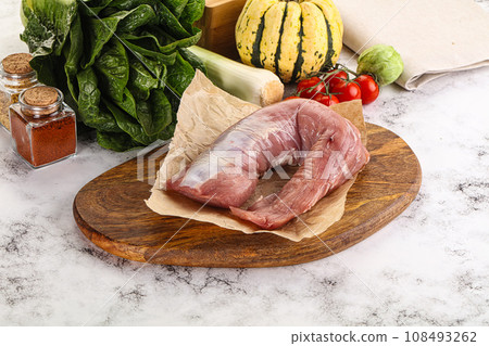 Uncooked raw pork tenderloin with spices 108493262