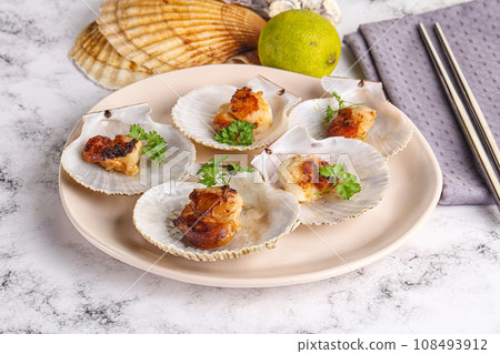 Grilled scallops shell with butter Grilled scallops shell with butter 108493912