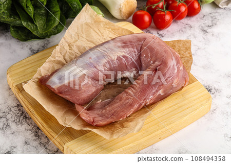 Uncooked raw pork tenderloin with spices 108494358