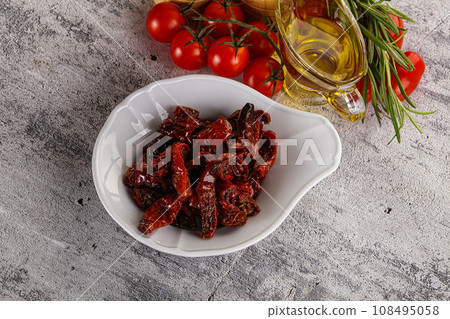 Homemade dry tomatoes with oil Homemade dry tomatoes with oil 108495058