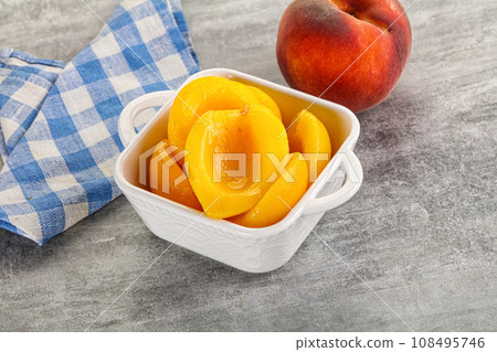 Ripe sweet and juicy canned peach Ripe sweet and juicy canned peach 108495746