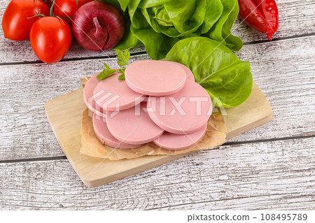 Slices boiled sausages for breakfast 108495789