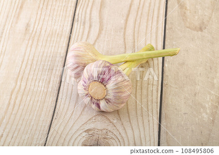 Two Young garlic over background Two Young garlic over background 108495806