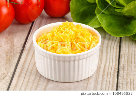 Shredded cheese in the bowl Shredded cheese in the bowl 108495822
