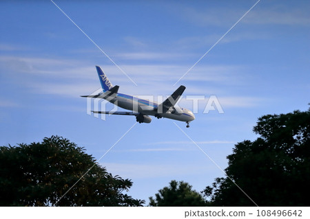 Passenger plane taking off and landing image 108496642
