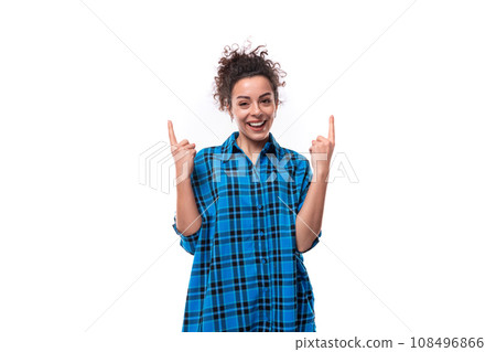 young joyful european woman with curly hair showing thumbs up 108496866