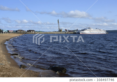 Berth on Lake Onega with ships and cranes in Petrozavodsk, Karelia, Russia Berth on Lake Onega with ships and cranes in Petrozavodsk, Karelia, Russia 108497746
