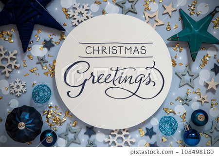 Text Christmas Greetings, Blue Flatlay, Christmas, Winter Decor Text Christmas Greetings, Blue Flatlay, Christmas, Winter Decor 108498180