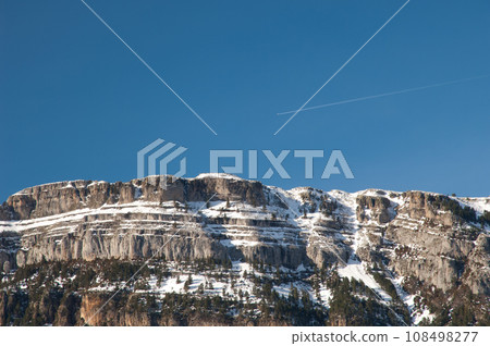 Airplane flying on the cliff of las Sestrales. 108498277