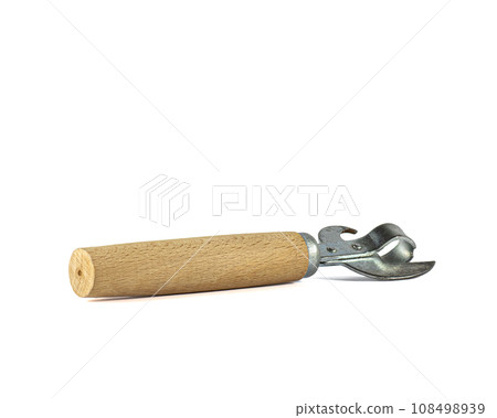 An old can opener with a wooden handle - a time-tested solution to problems 108498939