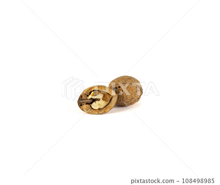 Pile of peeled walnuts, closeup. 108498985
