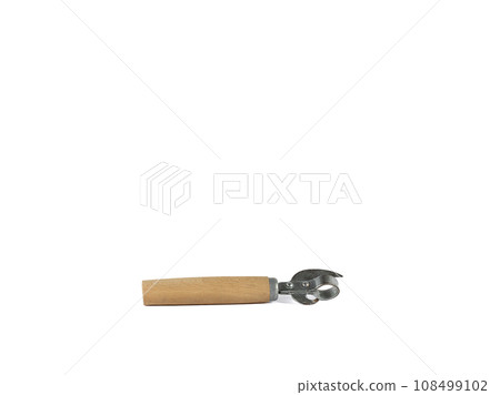 An old can opener with a wooden handle - a time-tested solution to problems 108499102