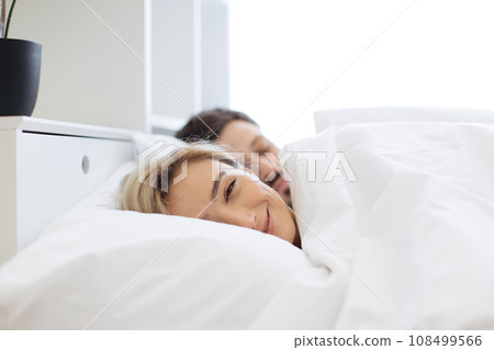 Caucasian couple spending morning together at home Caucasian couple spending morning together at home 108499566