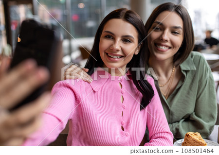 Happy girls spending time together and looking excited 108501464