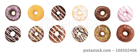 Top view of Donuts collection with colorful sprinkles isolated on white background.  108502406
