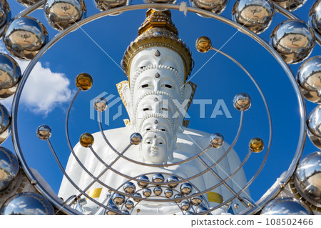 Wat Phra That Pha Kaew, Phetchabun is one of the top Thailand famous temples with a huge five white jade buddhas layered statue sitting on the big lotus, called The Sanctuary of the Five Buddhas. 108502466