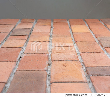 Close up to foam brick board, the element for cover and install with polyurethane glue on the wall Close up to foam brick board, the element for cover and install with polyurethane glue on the wall 108502478