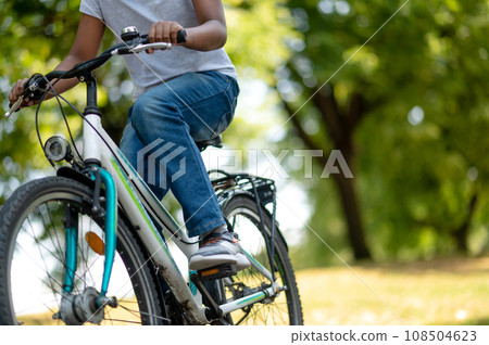 Cute african american girl riding a park 108504623