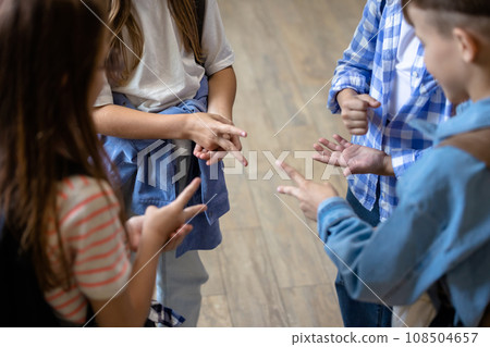 Kids playing finger game at break at school 108504657