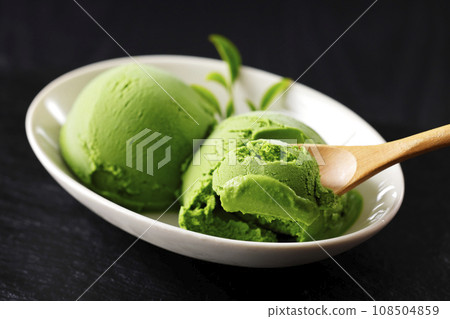 Matcha ice cream served on a white plate 108504859