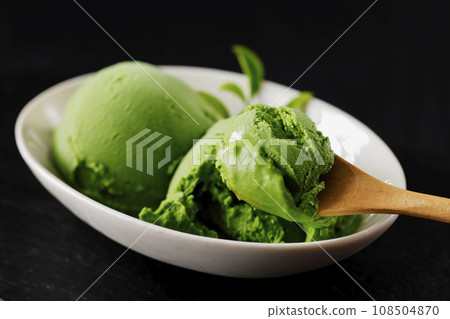 Matcha ice cream served on a white plate Matcha ice cream served on a white plate 108504870