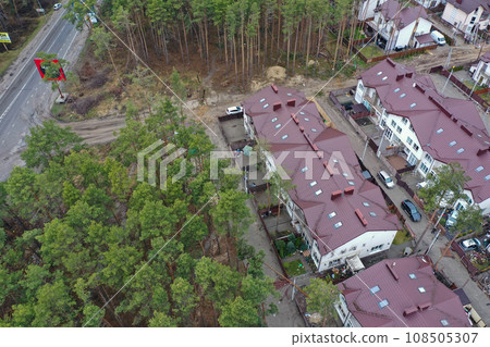 Hostomel, Kyev region Ukraine - 09.04.2022: Top view of the destroyed and burnt houses. Houses were destroyed by rockets or mines from Russian soldiers. Cities of Ukraine after the Russian occupation. Hostomel, Kyev region Ukraine - 09.04.2022: Top view of the destroyed and burnt houses. Houses were destroyed by rockets or mines from Russian soldiers. Cities of Ukraine after the Russian occupation. 108505307