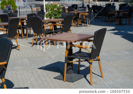 Street Restaurant Table, Empty Cafe Tables, Bar Terrace, Outdoor Restaurants, Outside Trattoria Street Restaurant Table, Empty Cafe Tables, Bar Terrace, Outdoor Restaurants, Outside Trattoria 108507550